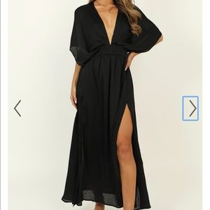 Black low cut dress with slit